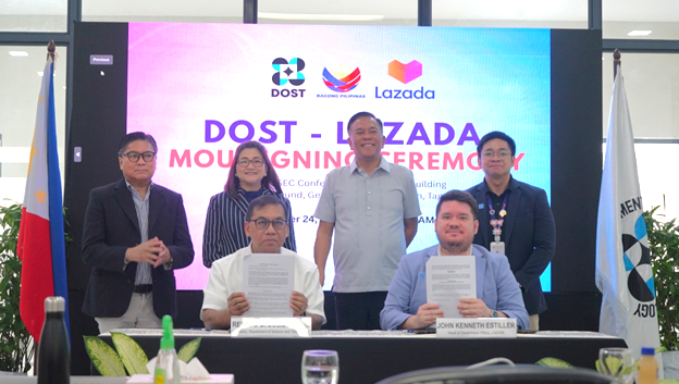 DOST Secretary Renato U. Solidum Jr. (seated, left) together with Lazada Philippines John Kenneth Estiller formalized the partnership with the e-commerce platform that will benefit local MSMEs in expanding their market reach. Also, in photo are DOST officials (L-R) Assistant Secretary Napoleon K. Juanillo Jr., Assistant Secretary Maria Teresa B. De Guzman, and Undersecretary Sancho A. Mabborang.
